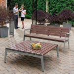 Table. Stylish. Recycled Planks. Maintenance free.