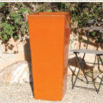 Tall orange ceramic planter